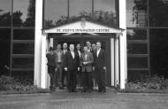 David Gill (4th left) welcomes David Jenkins (4th right) and the Milner team to SJIC